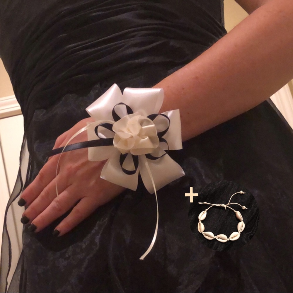 Ribbon wrist corsage on a Hawaiian shell bracelet